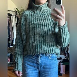 green sweater